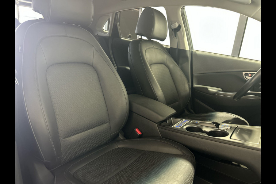 Hyundai Kona EV Premium 64 kWh | Warmtepomp | Verwarmde en geventileerde stoelen | Soh (batterijcheck) 91,8 %