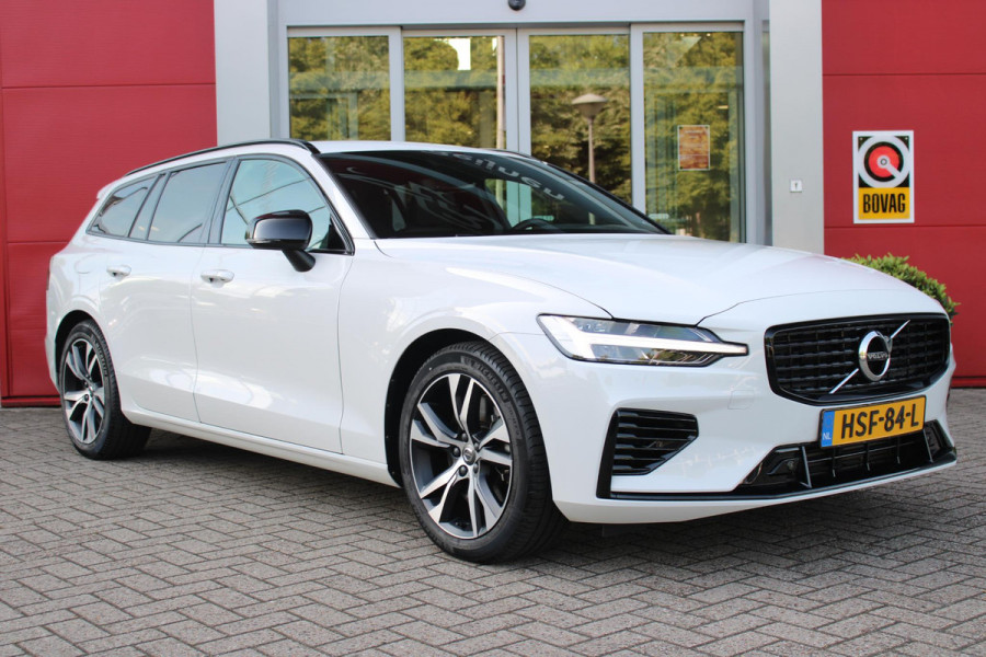 Volvo V60 2.0 T6 340PK RECHARGE AWD R-DESIGN **NIEUWSTAAT!** | ELEKTRISCH BEDIENBARE VOORSTOELEN MET GEHEUGEN OP BESTUURDERSSTOEL | 18" 5-Y SPAAKS MATT BLACK / DIAMOND CUT R-DESIGN WIELEN | HIGH PERFORMANCE SOUND HARMAN KARDON | ADAPTIVE CRUISE CONTROL | ACHTERUITRIJ CAMERA | GETINTE RUITEN | PARKEERSENSOREN VOOR EN ACHTER | STOEL/STUUR VERWARMING | BEKLEDING R-DESIGN NAPPA LEDER / TEXTIEL CHARCOAL IN COMBINATIE MET SPORTSTOELEN | KEYLESS ENTRY/START | ELEKTRISCH BEDIENBARE ACHTERKLEP |