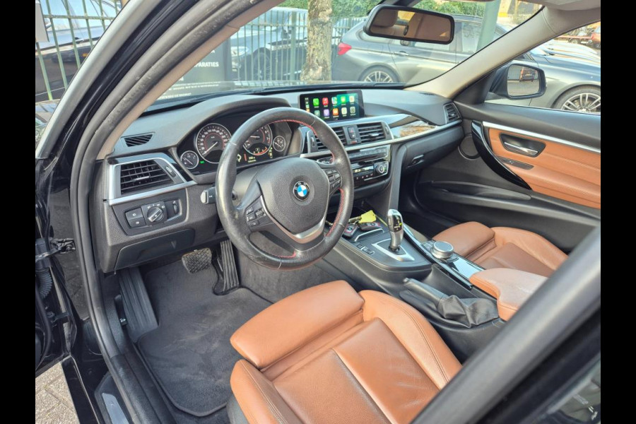 BMW 3-serie 320i Apple CarPlay NBT EVO NAVI Trekhaak Elekt. 2e eigenaar High Executive Sport Stoelen