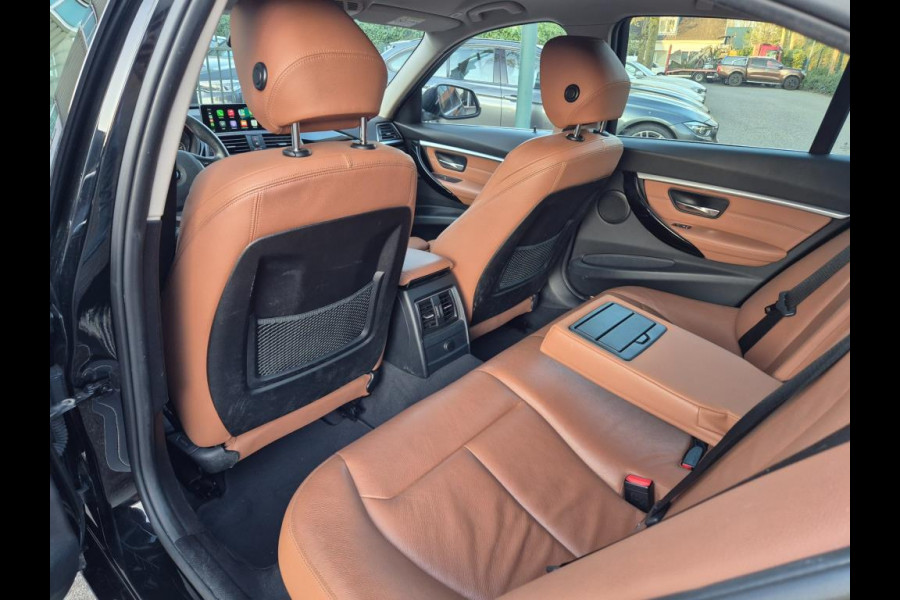 BMW 3-serie 320i Apple CarPlay NBT EVO NAVI Trekhaak Elekt. 2e eigenaar High Executive Sport Stoelen