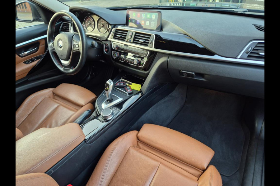 BMW 3-serie 320i Apple CarPlay NBT EVO NAVI Trekhaak Elekt. 2e eigenaar High Executive Sport Stoelen