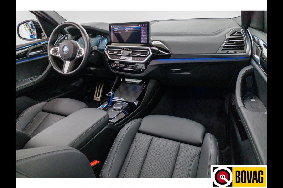BMW iX3 M-Sport Shadowline 80 kWh 286 PK | Pano | Leer | Elect. stoelen best. met geh. | Camera | Parkeerassistent pakket Licht- en regensensor, PDC, Sportstoelen, Stoelverwarming, Led, Camera, Privacy glas