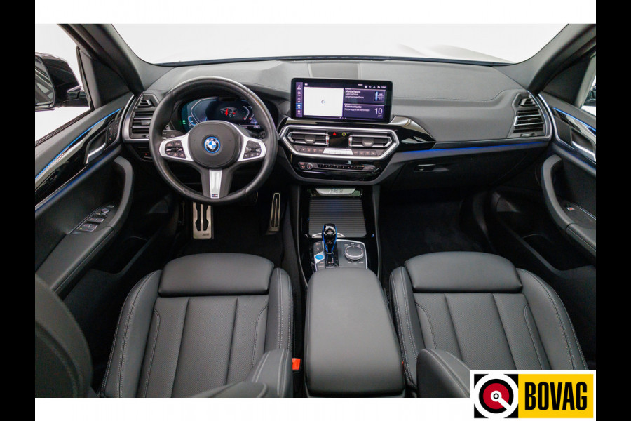 BMW iX3 M-Sport Shadowline 80 kWh 286 PK | Pano | Leer | Elect. stoelen best. met geh. | Camera | Parkeerassistent pakket Licht- en regensensor, PDC, Sportstoelen, Stoelverwarming, Led, Camera, Privacy glas
