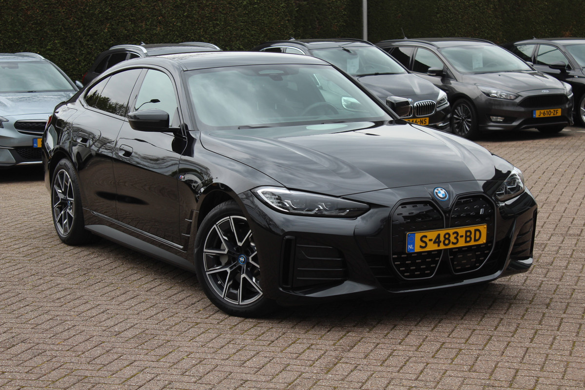 BMW i4 eDrive40 High Executive 84 kWh M Sport / SoH 96% / 360Camera / Head-up / Leder / Harman Kardon / Virtual Cockpit / 18'' / Navigatie / Harman Kardon / Stoelverwarming / DAB / ACC BMW i4 eDrive40 High Executive 84 kWh M Sport / SoH 96% / 360Camera / Head-up / Leder / Harman Kardon / Virtual Cockpit / 18'' / Navigatie / Harman Kardon / Stoelverwarming / DAB / ACC