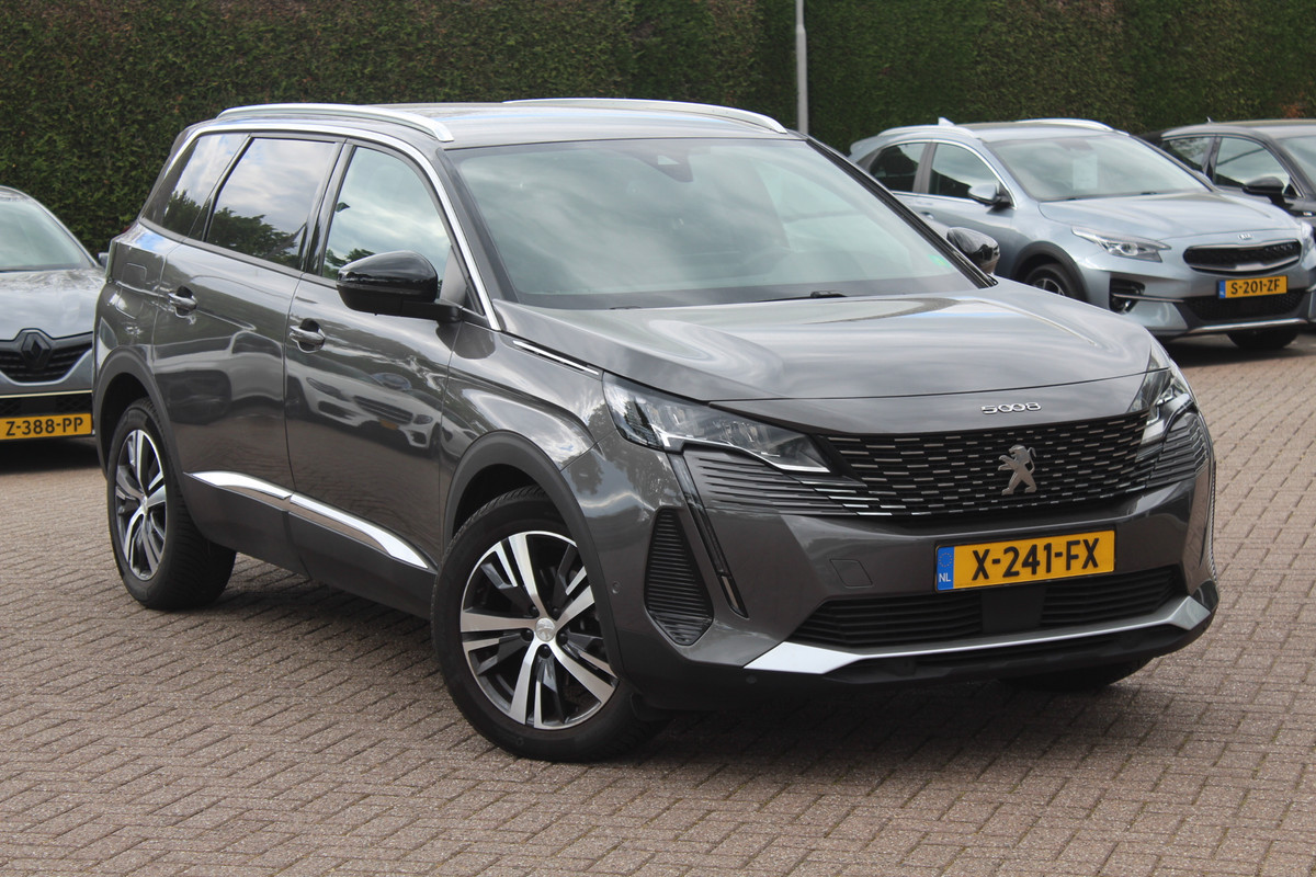 Peugeot 5008 1.2 Hybrid Allure Pack Business 7p. / Camera / Half leder / Navigatie / 18'' / Keyless / Dodehoek / Stoelverwarming / Cruise Control Peugeot 5008 1.2 Hybrid Allure Pack Business 7p. / Camera / Half leder / Navigatie / 18'' / Keyless / Dodehoek / Stoelverwarming / Cruise Control