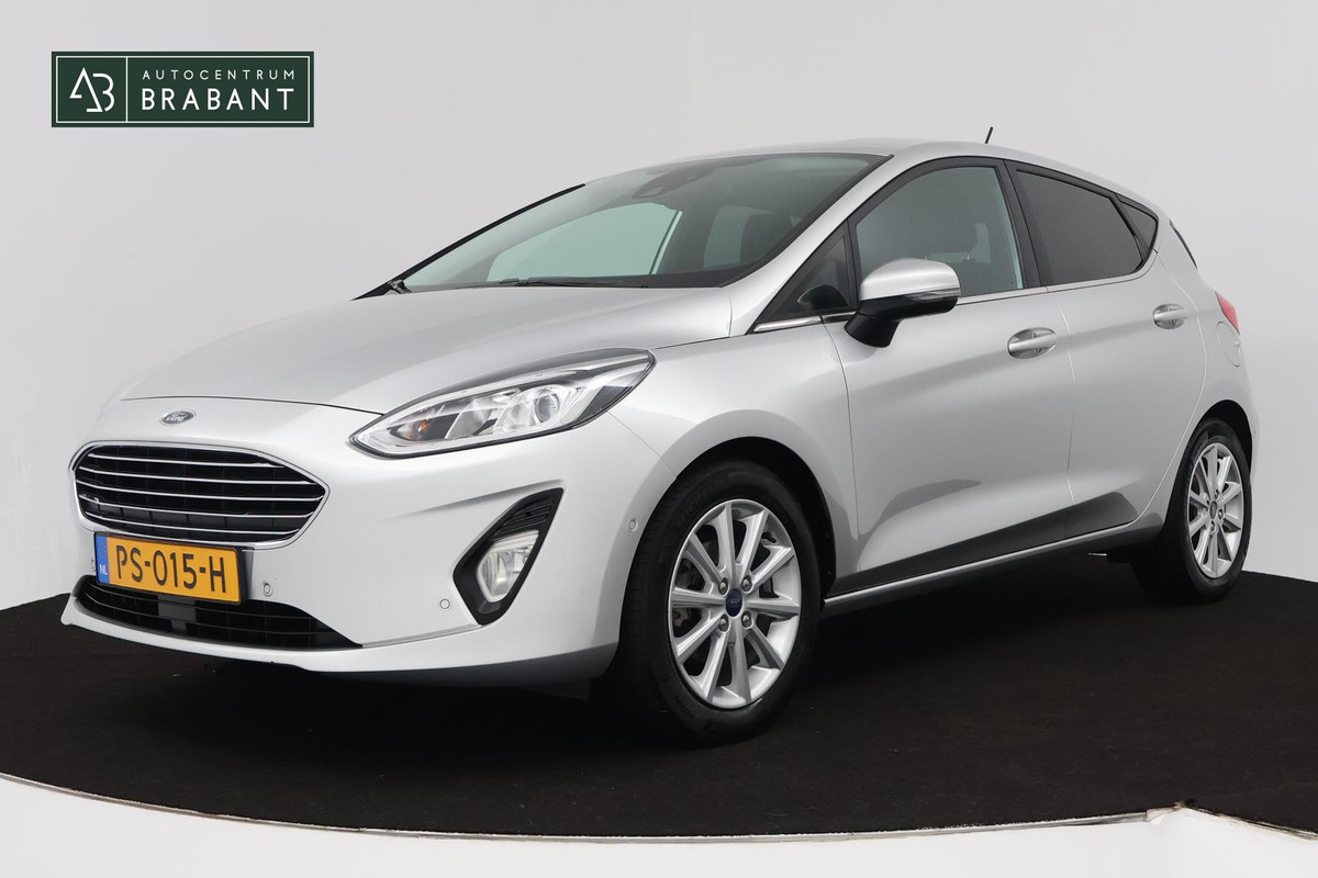 Ford Fiesta 1.0 EcoBoost Titanium Business (NAVIGATIE, PARKEERSENSOREN, ACHTERUITRIJCAMERA, CRUISE ADAPTIEF, NL-AUTO) Ford Fiesta 1.0 EcoBoost Titanium Business (NAVIGATIE, PARKEERSENSOREN, ACHTERUITRIJCAMERA, CRUISE ADAPTIEF, NL-AUTO)
