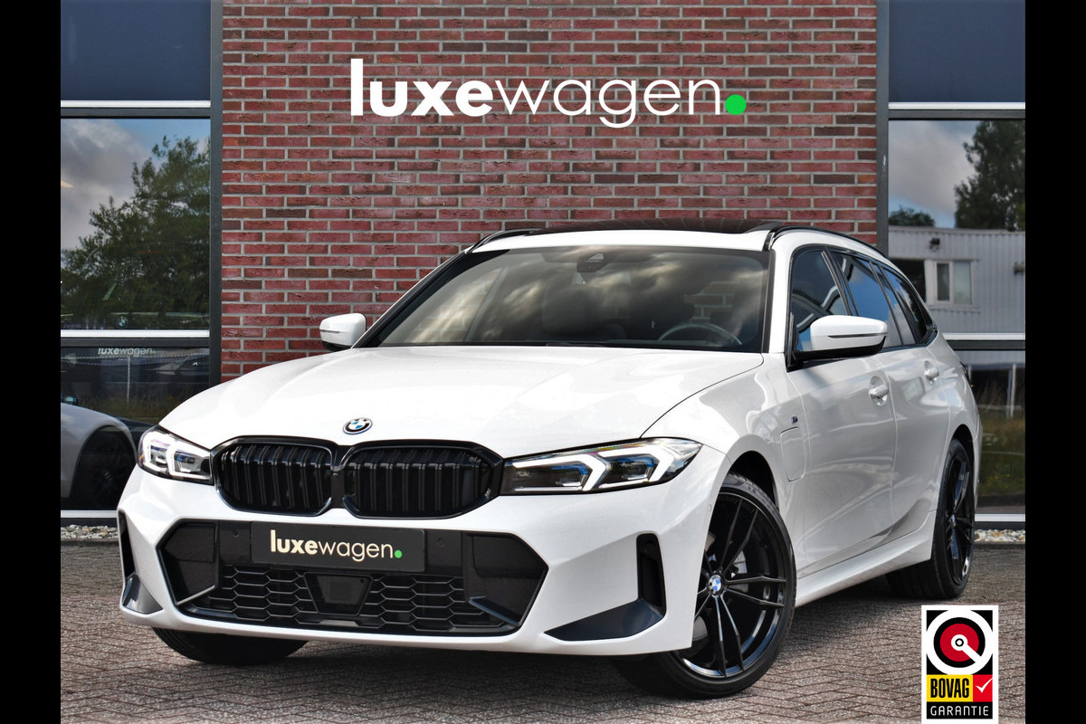 BMW 3 Serie Touring 330e M-Sport Pano ACC El-zetel HUD 19inch Camera Adp-onderstel BMW 3 Serie Touring 330e M-Sport Pano ACC El-zetel HUD 19inch Camera Adp-onderstel