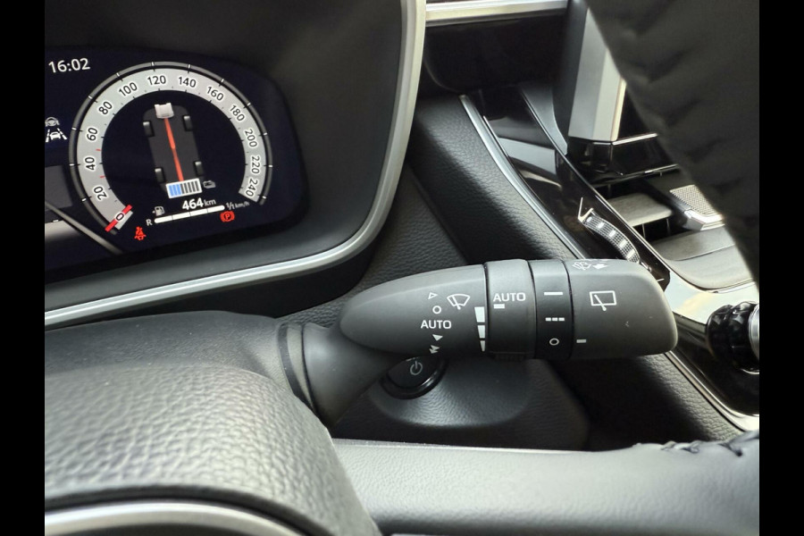 Toyota Corolla Cross Hybrid 140 Dynamic ook in kleur zwart en blauw
