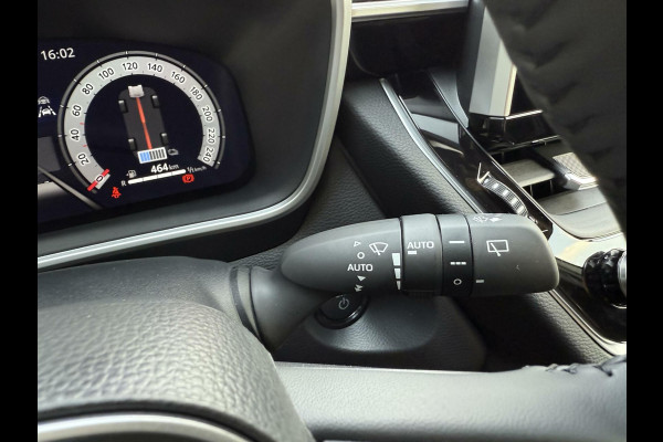 Toyota Corolla Cross Hybrid 140 Dynamic ook in kleur zwart en blauw