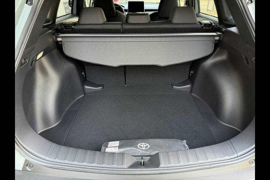 Toyota Corolla Cross Hybrid 140 Dynamic ook in kleur zwart en blauw