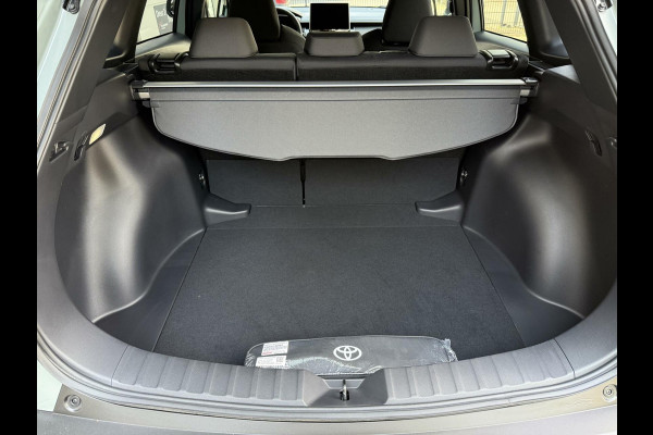 Toyota Corolla Cross Hybrid 140 Dynamic ook in kleur zwart en blauw