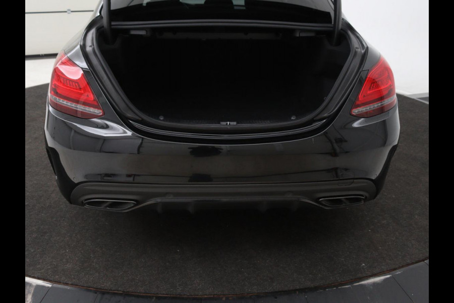 Mercedes-Benz C-Klasse 180 Business Solution AMG | Panoramadak | Leder | Stoelverwarming | Cruise control | 360 Camera | Elektrische achterklep | Carplay | Burmester