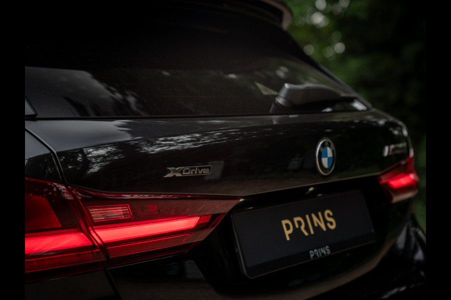 BMW 1-serie M135i xDrive High Executive | Pano-dak | Head-up | Sportstoelen | Adaptief onderstel