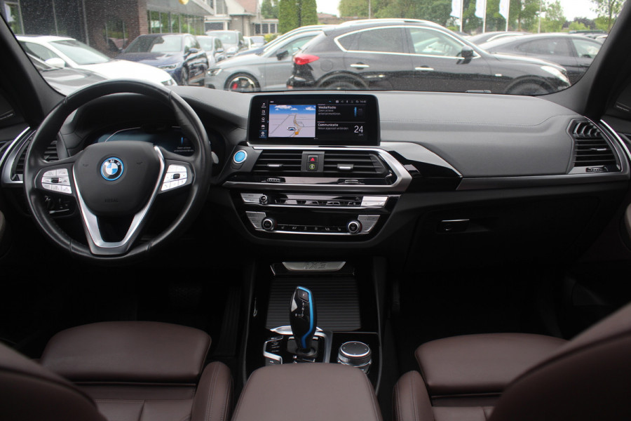 BMW iX3 High Executive 80 kWh / Trekhaak / Panoramadak / 360Camera / Head-up / 20'' / Leder / Harman Kardon / Navigatie / Memory seats / Dodehoek / DAB / Stoelverwarming / Cruise Control Adaptief