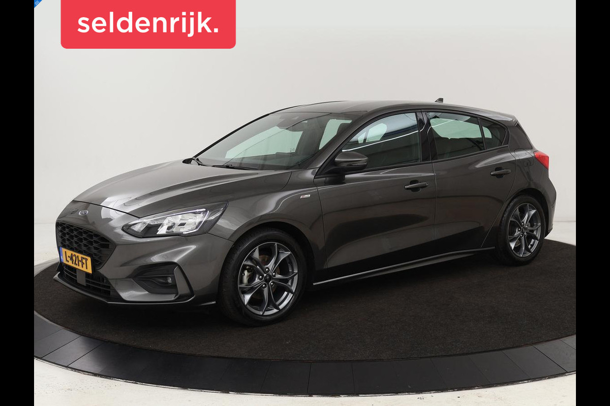Ford Focus 1.0 EcoBoost ST Line | Stoel & stuurverwarming | Carplay | Navigatie | Climate control | Parkeerhulp | Cruise control | Bluetooth Ford Focus 1.0 EcoBoost ST Line | Stoel & stuurverwarming | Carplay | Navigatie | Climate control | Parkeerhulp | Cruise control | Bluetooth