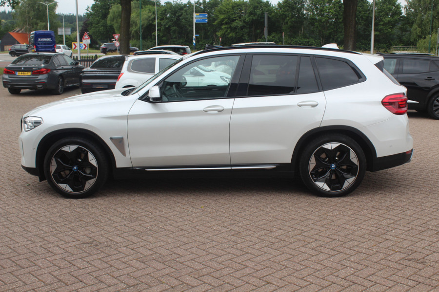 BMW iX3 High Executive 80 kWh / Trekhaak / Panoramadak / 360Camera / Head-up / 20'' / Leder / Harman Kardon / Navigatie / Memory seats / Dodehoek / DAB / Stoelverwarming / Cruise Control Adaptief