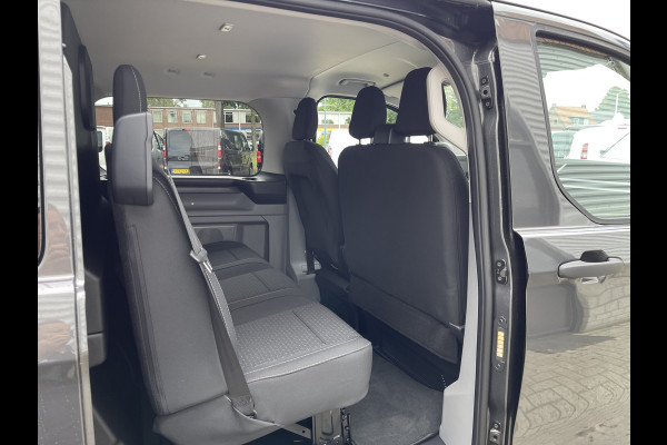 Ford Transit Custom 340 2.0 TDCI L2H1 Trend DC 6 persoons / NIEUW / bpm vrij / rijklaar € 39.950 ex btw / lease vanaf € 715 / direct leverbaar / airco / cruise / apple carplay / camera / magnetic grey metallic