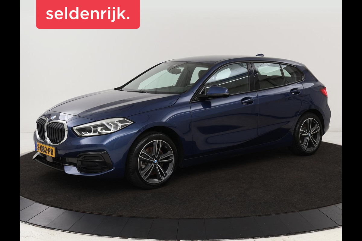 BMW 1-serie 118i Intro Ed. | Carplay | Full LED | Sportstoelen | Navigatie | Climate control | Bleutooth | PDC | Trekhaak | Sfeerverlichting BMW 1-serie 118i Intro Ed. | Carplay | Full LED | Sportstoelen | Navigatie | Climate control | Bleutooth | PDC | Trekhaak | Sfeerverlichting