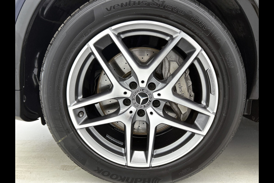 Mercedes-Benz GLC 250 4MATIC Business Solution AMG | Schuif/kanteldak | Treeplanken | 5 spaaks licht metalen velgen | Navigatie Parking support met camera achter | Inclusief 12 Maanden Garantie