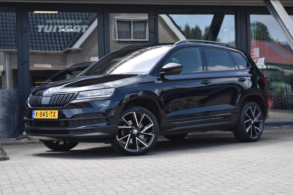 Škoda Karoq 1.5 TSI ACT Sportline | NAP | VIRTUAL COCKPIT | DEALER ONDERHOUDEN | CAMERA | STOELVERWARMING | APPLE CARPLAY Škoda Karoq 1.5 TSI ACT Sportline | NAP | VIRTUAL COCKPIT | DEALER ONDERHOUDEN | CAMERA | STOELVERWARMING | APPLE CARPLAY