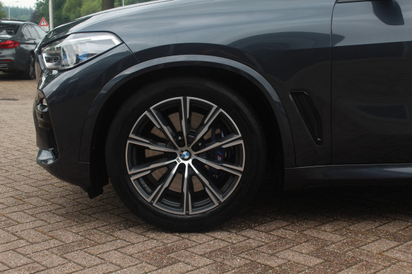 BMW X5 xDrive30d High Exe. 7p. M Sport / Trekhaak / Panoramadak / Camera / Head-up / Softclose / 20'' / Harman Kardon / Luchtvering / Laser LED / Keyless / Leder / Apple CarPlay / Stuurverwarming / DAB / ACC / Zonnescherm zijruite