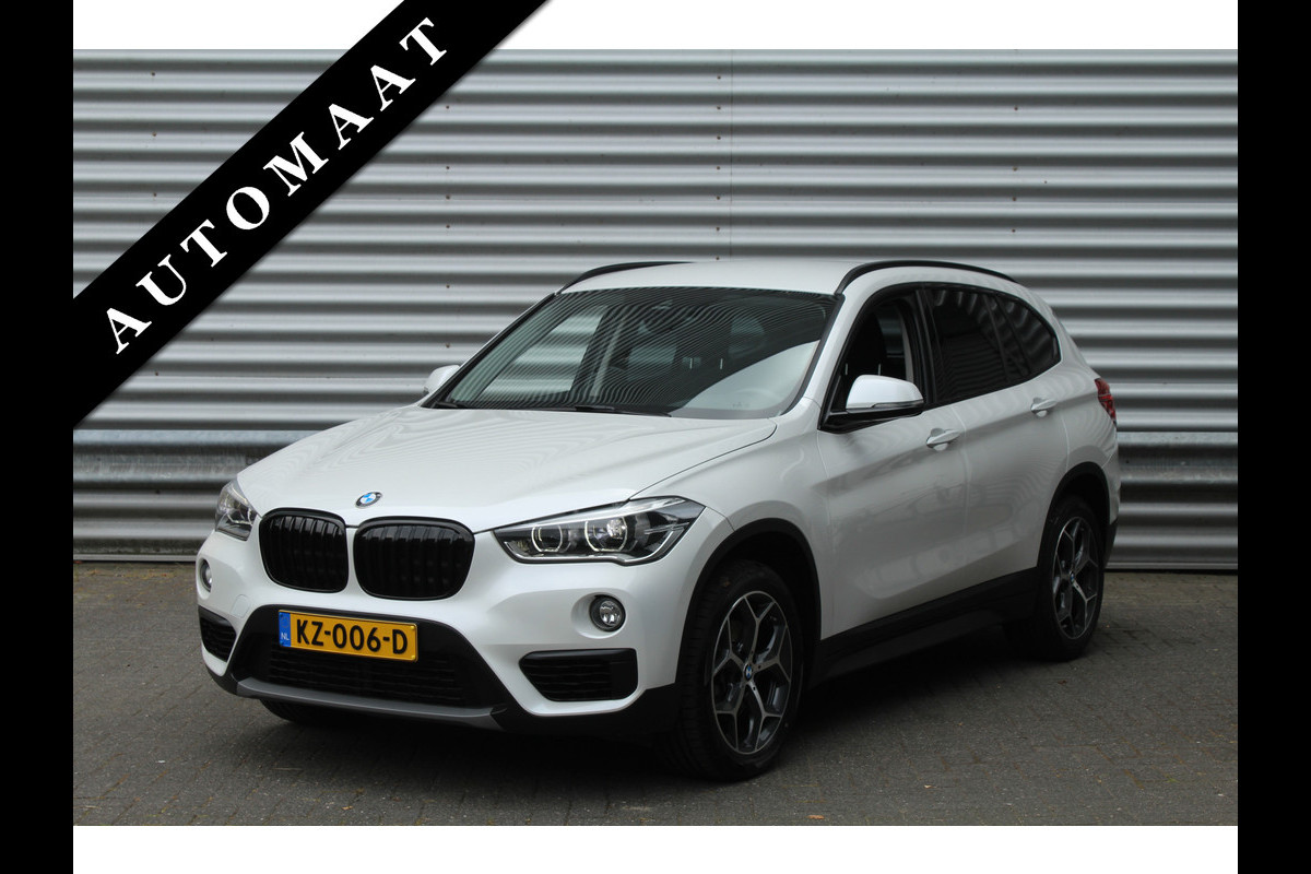 BMW X1 sDrive18i 136pk Centennial Executive AUTOMAAT NL-Auto NAP Clima Cruise Navi PDC 17"LMV Afn. Trekaak 1700kg BMW X1 sDrive18i 136pk Centennial Executive AUTOMAAT NL-Auto NAP Clima Cruise Navi PDC 17"LMV Afn. Trekaak 1700kg