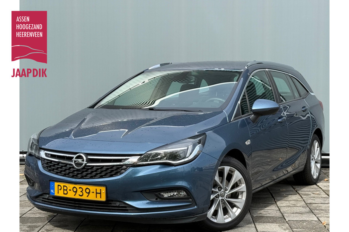 Opel Astra Sports Tourer BWJ 2017 | 1.4 150PK Online Edition | AIRCO | SPORTSTOELEN | NAVI | PDC | CRUISE | CARPLAY Opel Astra Sports Tourer BWJ 2017 | 1.4 150PK Online Edition | AIRCO | SPORTSTOELEN | NAVI | PDC | CRUISE | CARPLAY