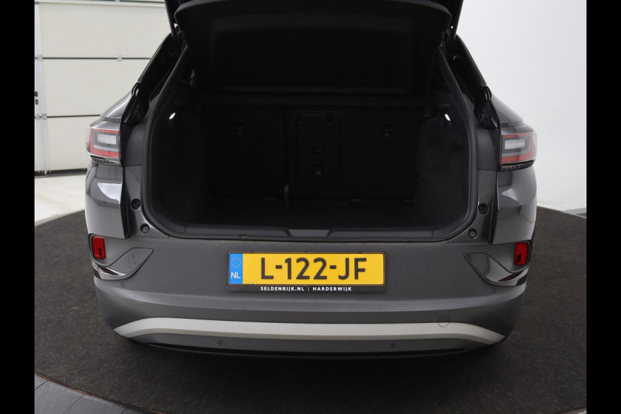 Volkswagen ID.4 First 77 kWh | Warmtepomp | Stoel & stuurverwarming | Carplay | Adaptive cruise | Full LED | Half leder | Navigatie | Parkeerhulp