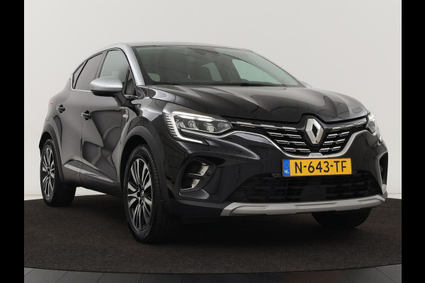 Renault Captur 1.6 E-Tech Hybrid 145 Initiale Paris | Leder | Stoel & stuurverwarming | Camera | Full LED | Park Assist | Carplay | BOSE Sound