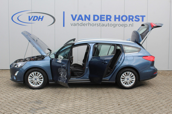 Ford FOCUS Wagon 1.5-120pk EcoBlue turbo diesel Titanium. Super nette en fijn rijdende Focus voor nog jaren plezier ! Stoel-, stuur- en voorraamverwarming, Navigatie, Bluetooth, Parkeersensoren V+A, Camera, Duozone climate, Metallic lak, LM wielen etc.