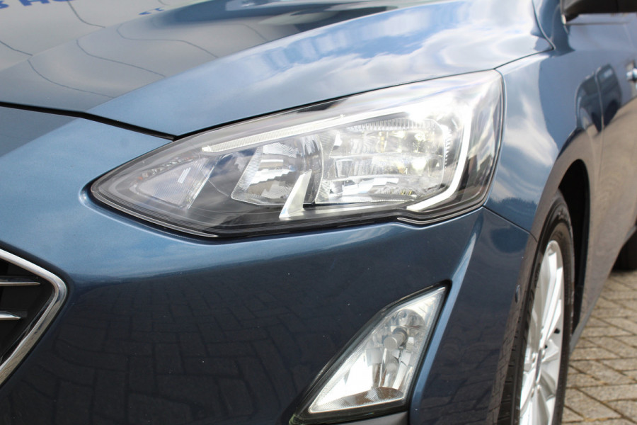 Ford FOCUS Wagon 1.5-120pk EcoBlue turbo diesel Titanium. Super nette en fijn rijdende Focus voor nog jaren plezier ! Stoel-, stuur- en voorraamverwarming, Navigatie, Bluetooth, Parkeersensoren V+A, Camera, Duozone climate, Metallic lak, LM wielen etc.