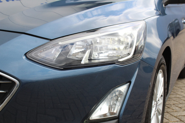 Ford FOCUS Wagon 1.5-120pk EcoBlue turbo diesel Titanium. Super nette en fijn rijdende Focus voor nog jaren plezier ! Stoel-, stuur- en voorraamverwarming, Navigatie, Bluetooth, Parkeersensoren V+A, Camera, Duozone climate, Metallic lak, LM wielen etc.