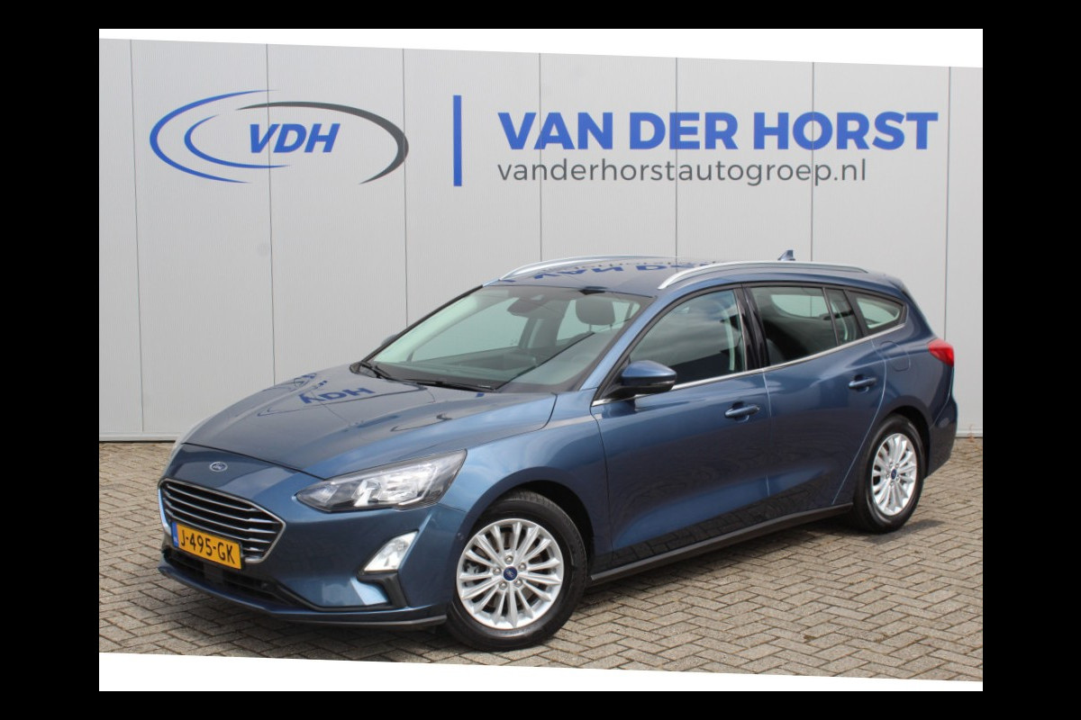 Ford FOCUS Wagon 1.5-120pk EcoBlue turbo diesel Titanium. Super nette en fijn rijdende Focus voor nog jaren plezier ! Stoel-, stuur- en voorraamverwarming, Navigatie, Bluetooth, Parkeersensoren V+A, Camera, Duozone climate, Metallic lak, LM wielen etc. Ford FOCUS Wagon 1.5-120pk EcoBlue turbo diesel Titanium. Super nette en fijn rijdende Focus voor nog jaren plezier ! Stoel-, stuur- en voorraamverwarming, Navigatie, Bluetooth, Parkeersensoren V+A, Camera, Duozone climate, Metallic lak, LM wielen etc.