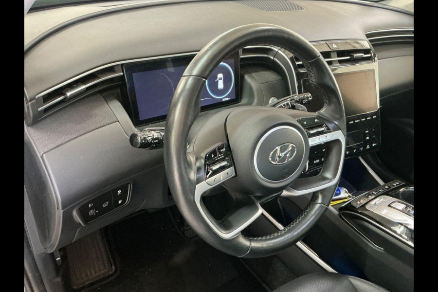 Hyundai Tucson 1.6 T-GDI PHEV Premium Sky 4WD | Panoramadak | Afneembare trekhaak | 4WD | Stoelverwarming | Stoelventilatie | Lederen bekleding | Elektrische achterklep | KRELL | All season banden