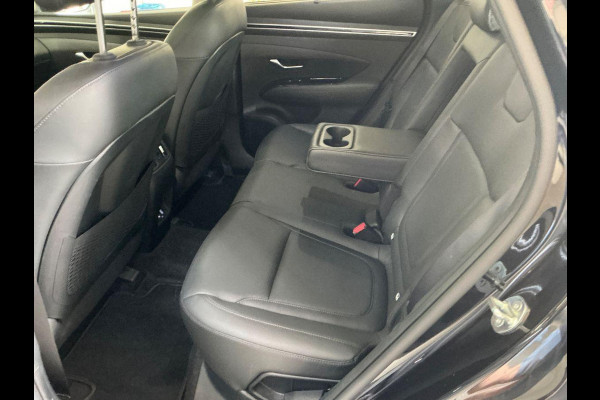 Hyundai Tucson 1.6 T-GDI PHEV Premium Sky 4WD | Panoramadak | Afneembare trekhaak | 4WD | Stoelverwarming | Stoelventilatie | Lederen bekleding | Elektrische achterklep | KRELL | All season banden