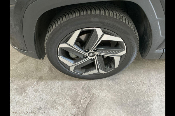 Hyundai Tucson 1.6 T-GDI PHEV Premium Sky 4WD | Panoramadak | Afneembare trekhaak | 4WD | Stoelverwarming | Stoelventilatie | Lederen bekleding | Elektrische achterklep | KRELL | All season banden
