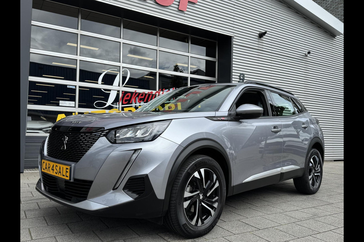 Peugeot 2008 1.2 PureTech Allure 131PK - Navigatie I LED/PDC I Achteruitrij camera I Airco I Sport velgen I Dealer onderhouden Peugeot 2008 1.2 PureTech Allure 131PK - Navigatie I LED/PDC I Achteruitrij camera I Airco I Sport velgen I Dealer onderhouden
