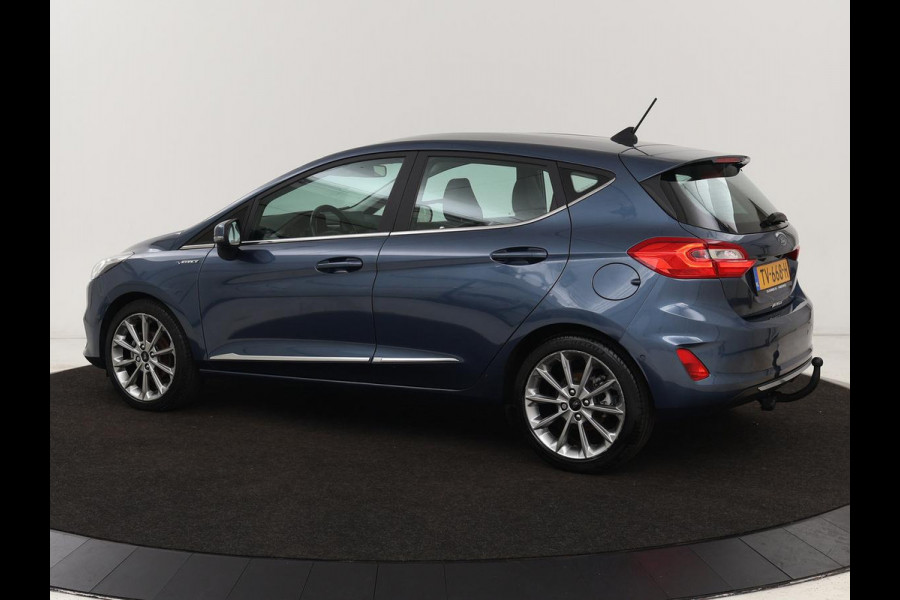 Ford Fiesta 1.0 EcoBoost Vignale | 125pk | Stoel & stuurverwarming | Half leder | B&O Sound | Trekhaak | Carplay | Keyless | Camera | Climate control | Park Assist | Cruise control | Navigatie