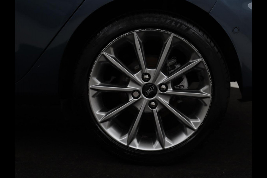 Ford Fiesta 1.0 EcoBoost Vignale | 125pk | Stoel & stuurverwarming | Half leder | B&O Sound | Trekhaak | Carplay | Keyless | Camera | Climate control | Park Assist | Cruise control | Navigatie