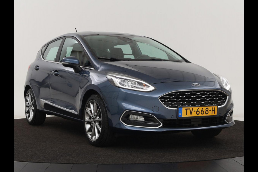 Ford Fiesta 1.0 EcoBoost Vignale | 125pk | Stoel & stuurverwarming | Half leder | B&O Sound | Trekhaak | Carplay | Keyless | Camera | Climate control | Park Assist | Cruise control | Navigatie