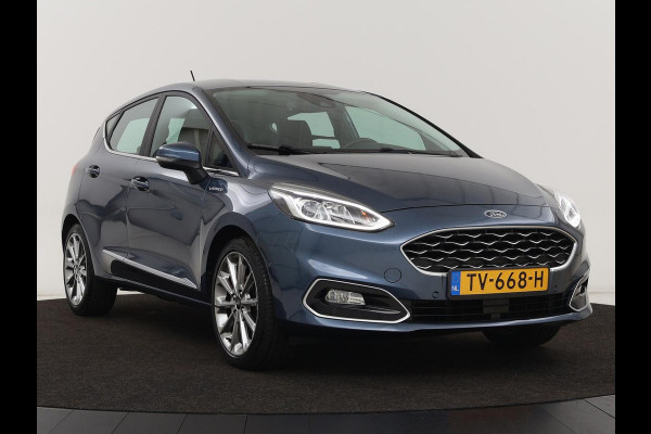 Ford Fiesta 1.0 EcoBoost Vignale | 125pk | Stoel & stuurverwarming | Half leder | B&O Sound | Trekhaak | Carplay | Keyless | Camera | Climate control | Park Assist | Cruise control | Navigatie