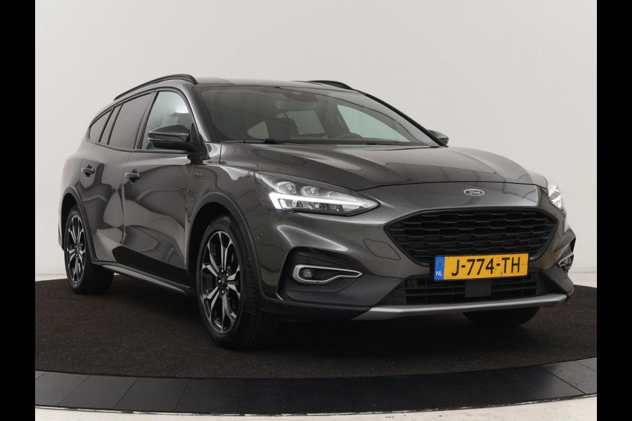 Ford Focus 1.0 EcoBoost Active | Trekhaak | Half leder | Stoel & stuurverwarming | B&O Sound | Camera | Adaptive cruise | Climate control | Keyless | Full LED