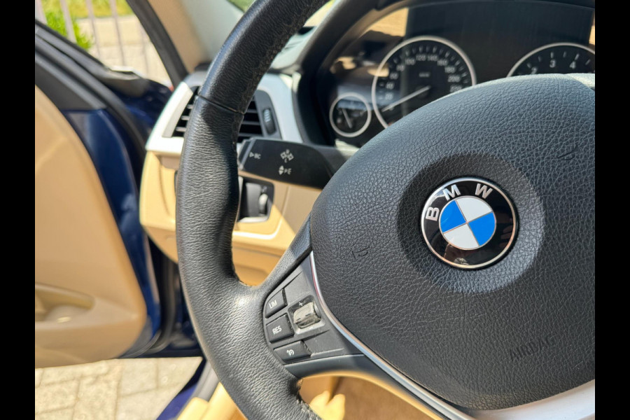 BMW 3-serie 320i High Executive 184 PK / PDC / NAVIGATIE / CRUISE / NL AUTO / LEDER / AUTOMAAT