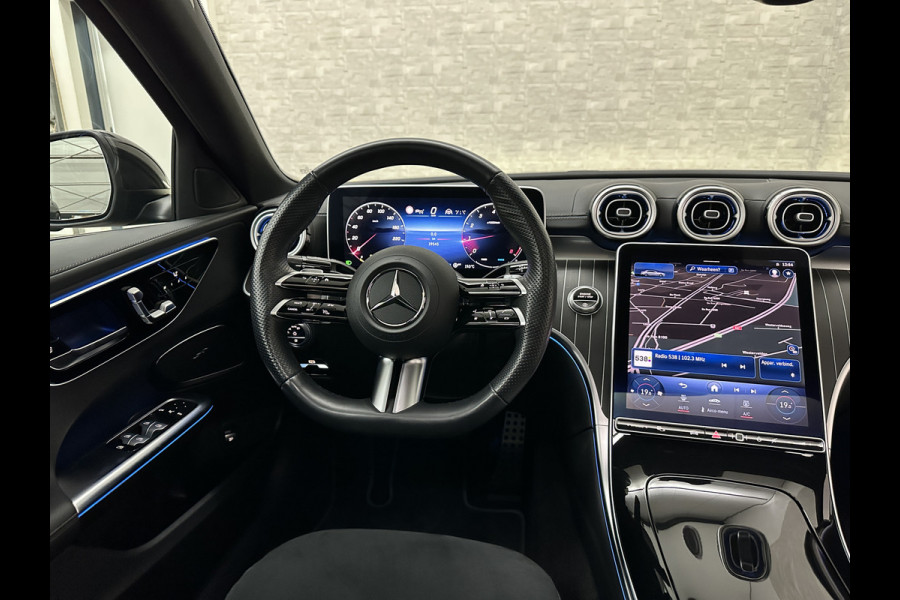 Mercedes-Benz C-Klasse 300 Benzine 4MATIC AMG-Line | 360 Camera | Panorama | ACC | 19'' | Digital-LED | Night-Pakket | Nw.pr; 100758,= | Memory | Trekhaak | Sfeerverlichting | Rij-Assistent Plus | Parfumering | Autom. Parkeren | Carplay | Draadloos Laden.