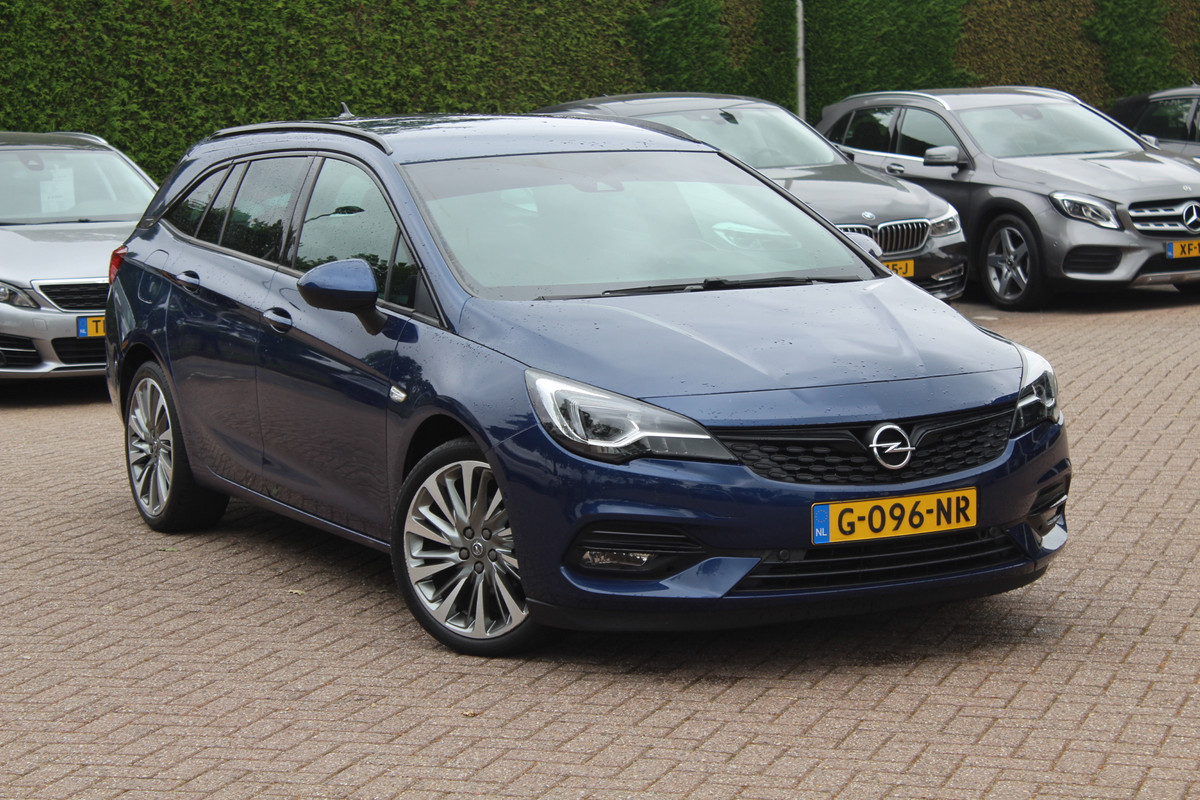 Opel Astra Sports Tourer 1.2 Launch Edition / Trekhaak / Camera / Navigatie / 18'' / Leder&Alcantara / LED Koplampen / Bose Audio / Stuur+Stoelverwarming / DAB / Cruise Control Opel Astra Sports Tourer 1.2 Launch Edition / Trekhaak / Camera / Navigatie / 18'' / Leder&Alcantara / LED Koplampen / Bose Audio / Stuur+Stoelverwarming / DAB / Cruise Control