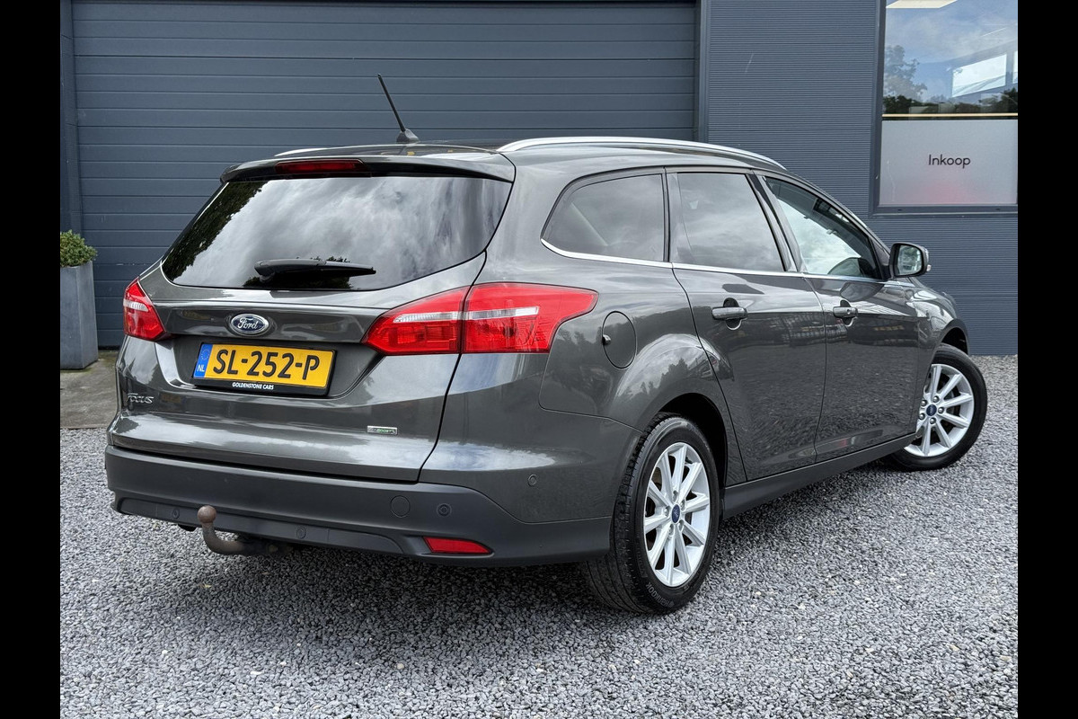 Ford FOCUS Wagon 1.0 Titanium 2e Eigenaar,125pk,Navi,Trekhaak,Stuurverwarming,Stoelverwarming,6 Bak,Pdc,Lmv,Apk tot 04-2026 Ford FOCUS Wagon 1.0 Titanium 2e Eigenaar,125pk,Navi,Trekhaak,Stuurverwarming,Stoelverwarming,6 Bak,Pdc,Lmv,Apk tot 04-2026