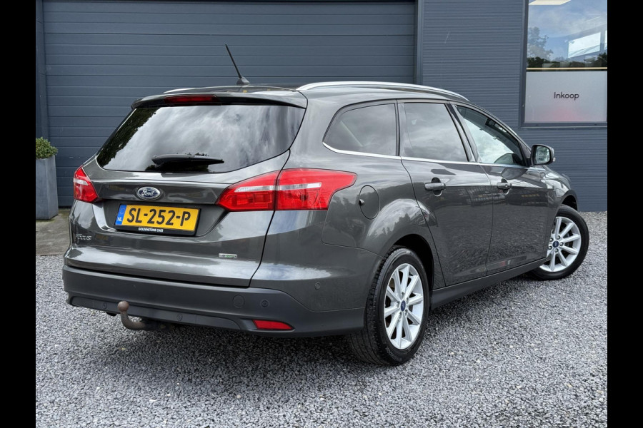 Ford FOCUS Wagon 1.0 Titanium 2e Eigenaar,125pk,Navi,Trekhaak,Stuurverwarming,Stoelverwarming,6 Bak,Pdc,Lmv,Apk tot 04-2026