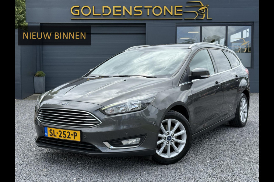 Ford FOCUS Wagon 1.0 Titanium 2e Eigenaar,125pk,Navi,Trekhaak,Stuurverwarming,Stoelverwarming,6 Bak,Pdc,Lmv,Apk tot 04-2026