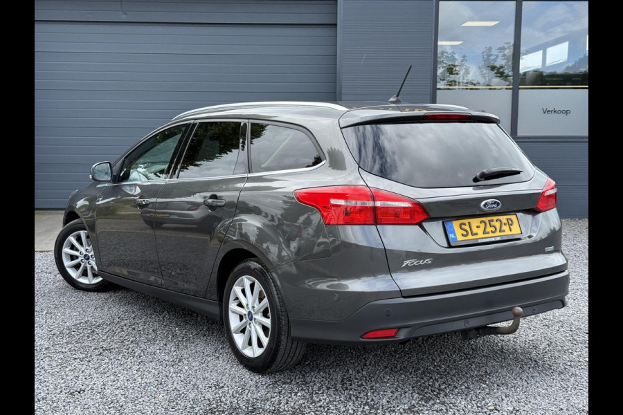 Ford FOCUS Wagon 1.0 Titanium 2e Eigenaar,125pk,Navi,Trekhaak,Stuurverwarming,Stoelverwarming,6 Bak,Pdc,Lmv,Apk tot 04-2026