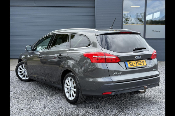 Ford FOCUS Wagon 1.0 Titanium 2e Eigenaar,125pk,Navi,Trekhaak,Stuurverwarming,Stoelverwarming,6 Bak,Pdc,Lmv,Apk tot 04-2026